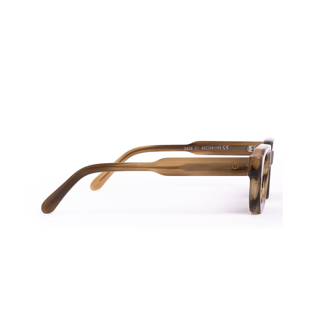 Lentes de sol Évo de Solivo, imagen que muestra la parte lateral con detalles en marrón, una opción versátil y chic para el verano.