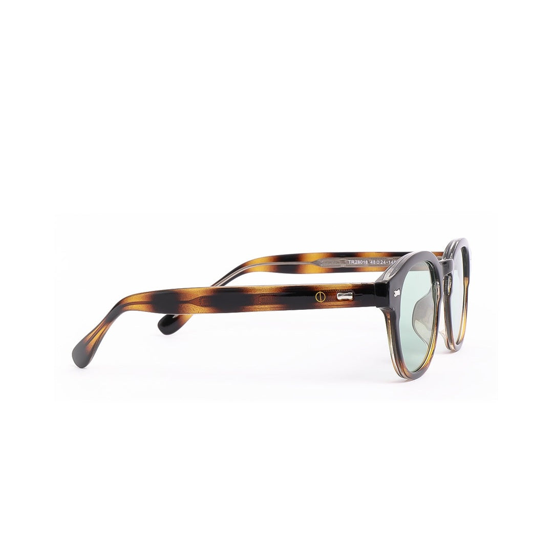 Lentes de sol LOND - Carey Celeste de Solivo, con diseño elegante y moderno en tonos carey, ideales para disfrutar del sol en actividades al aire libre.