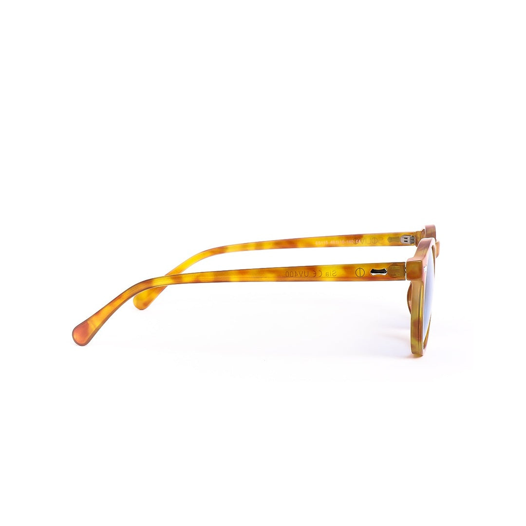 Perfil de los lentes de sol SIA - Carey Celeste de Solivo, con diseño elegante en tonos ámbar, reflejando un estilo moderno y sofisticado.