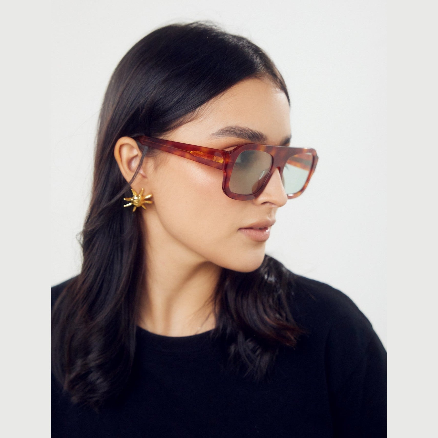 Lentes de sol Élan de Solivo en color naranja, con diseño moderno y elegante, ideales para proteger tus ojos con estilo en la soleada Costa Rica.