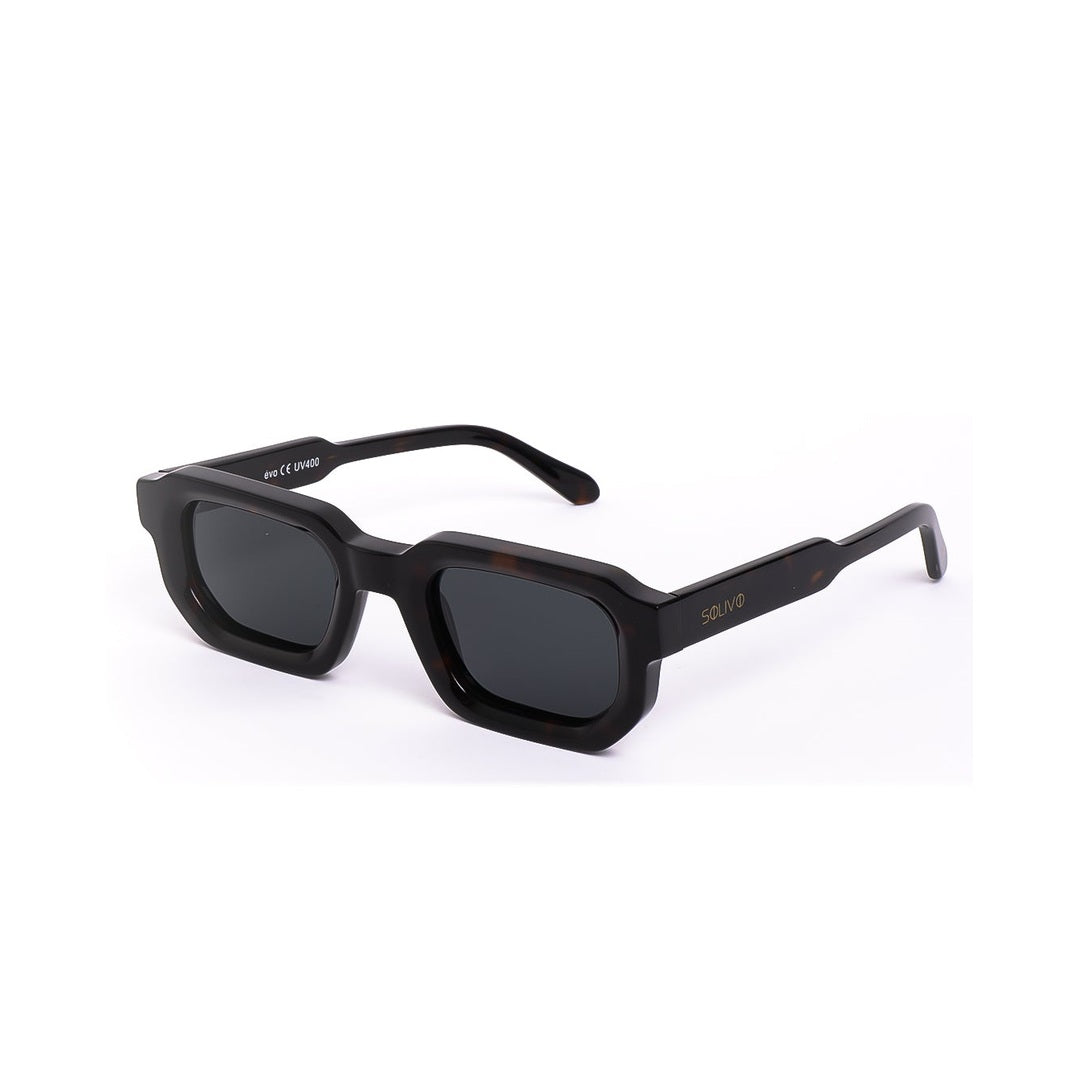 Lentes de sol Évo de Solivo, vista lateral en color negro, perfectos para un look contemporáneo y funcional.
