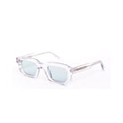 Lentes de sol Évo - Cristal de Solivo, capturados desde un ángulo lateral, mostrando su elegante diseño transparente y lentes polarizados verdes.