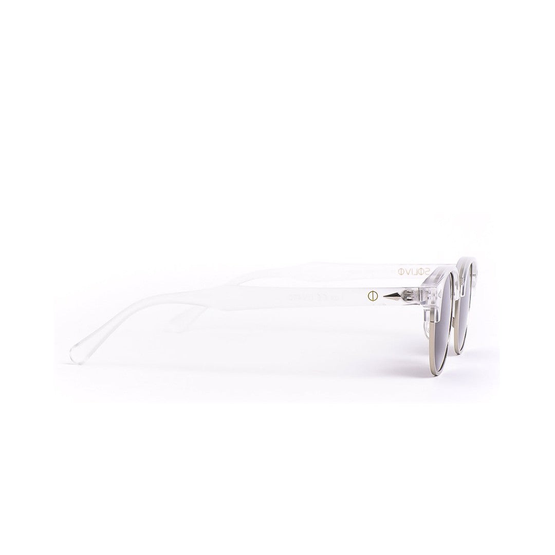 Vista lateral de los lentes de sol LUX Cristal de Solivo Eyewear — acabado translúcido, protección UV400