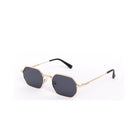 Lentes de sol OSAK de Solivo, diseño moderno en forma octagonal con cristales oscuros y estructura dorada, ideales para combinar elegancia y protección.