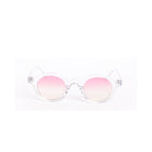 Lentes de sol PRAG en color cristal rosa de la marca Solivo, diseño elegante y moderno, ideales para complementar cualquier atuendo.