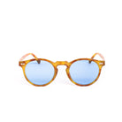 Gafas de sol SIA Carey Celeste de Solivo, con montura en tonos marrón y cristales azules, diseño elegante y moderno.