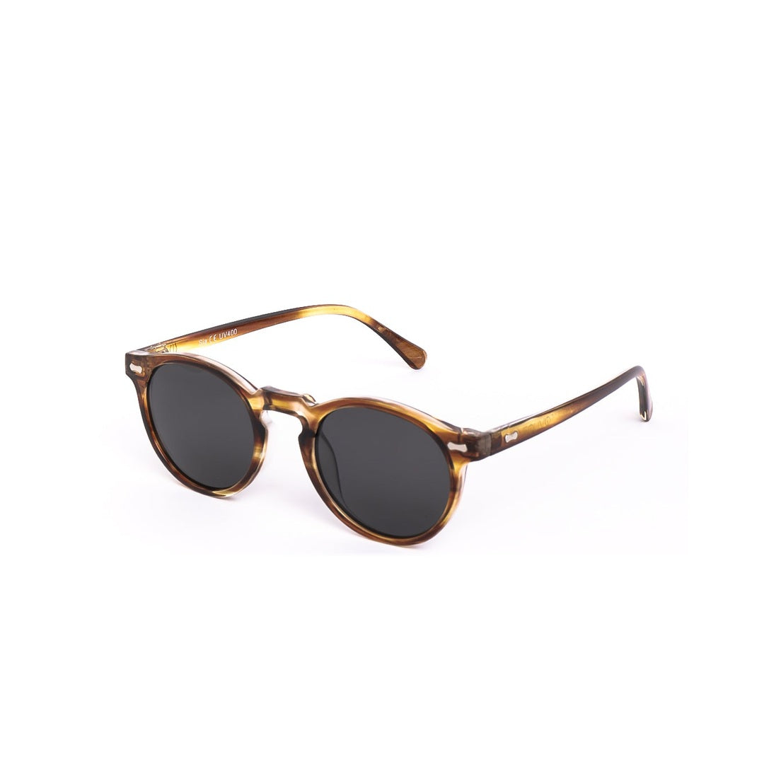 Lentes de sol SIA - Carey Negro de Solivo, vista lateral mostrando su diseño moderno y sofisticado, perfectos para cualquier ocasión.