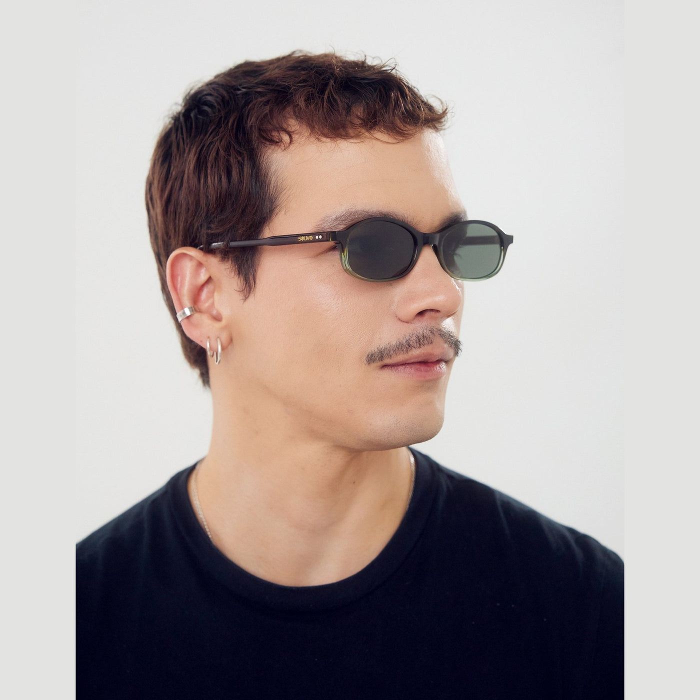 Detalle de los lentes de sol MEI Oliva de Solivo Eyewear — filtro UV400, acetato