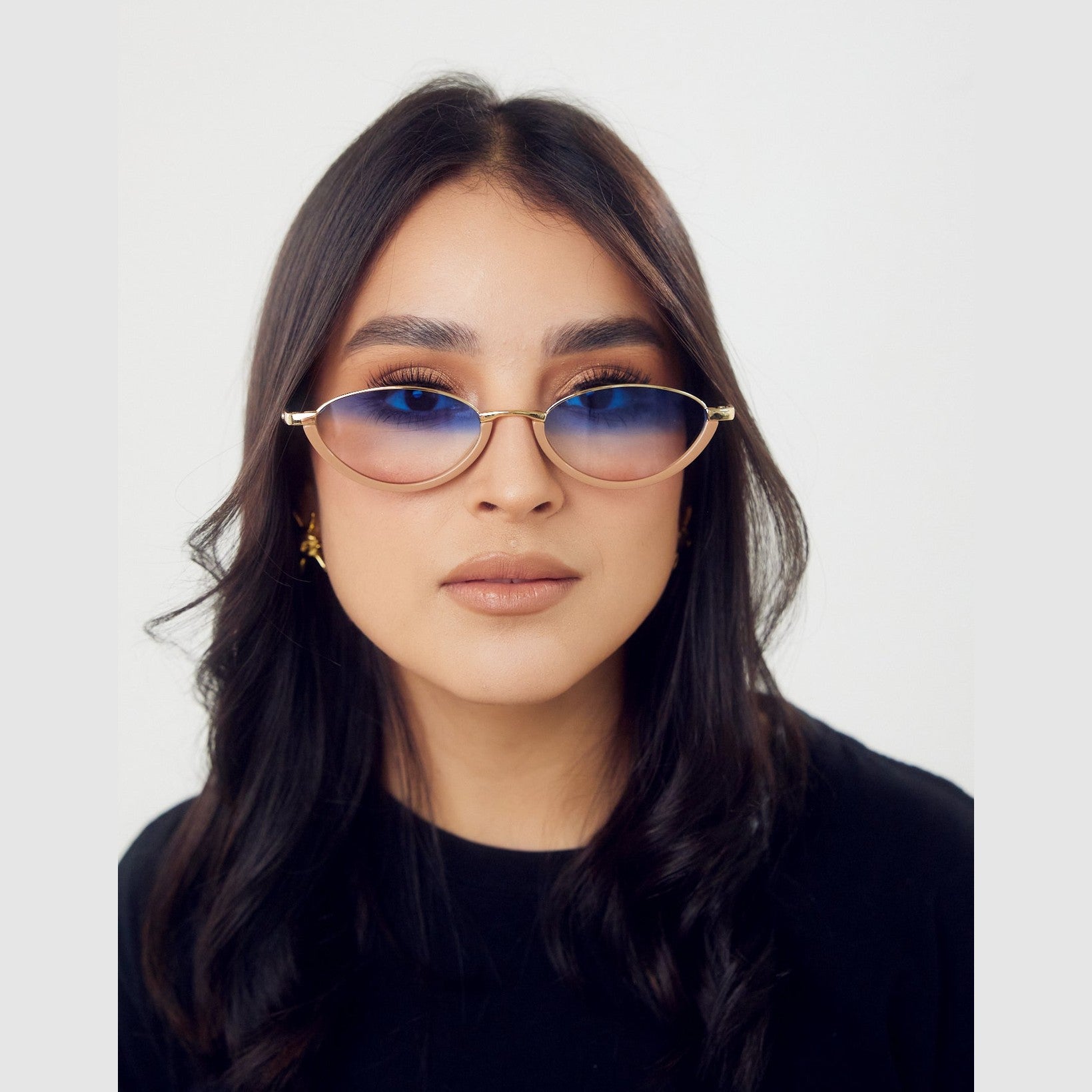 Lentes de sol TORO de Solivo, diseño elegante y moderno en café tricolor, ideales para protección UV y actividades al aire libre.