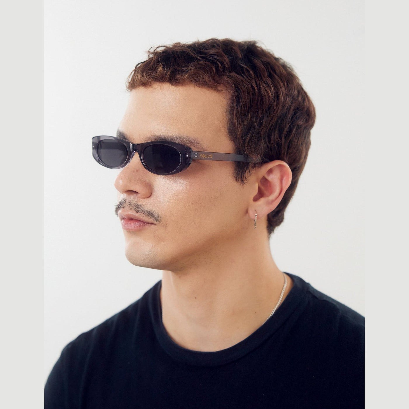 Detalle de los lentes de sol BOST Gris de Solivo Eyewear — filtro UV400, claridad visual