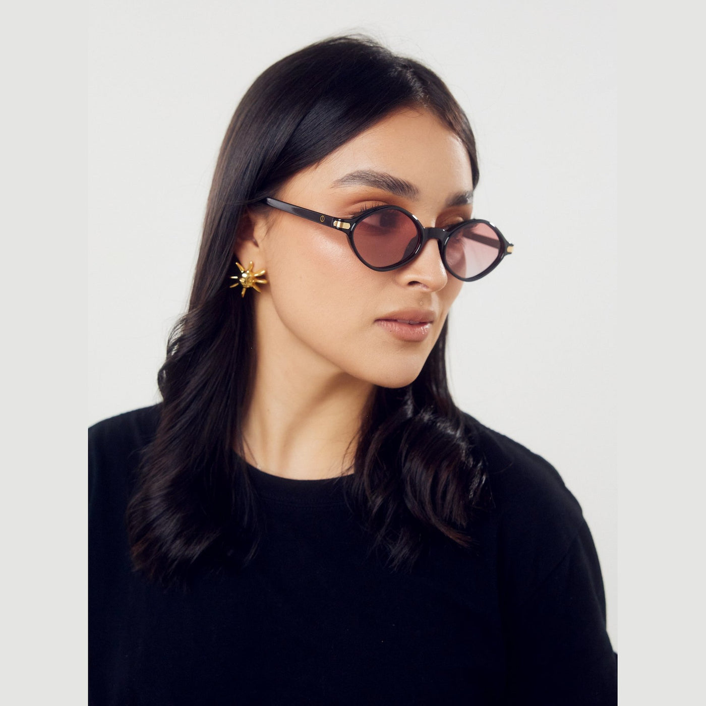 Detalle de los lentes de sol MIAM Negro Pink de Solivo Eyewear — filtro UV400, claridad visual