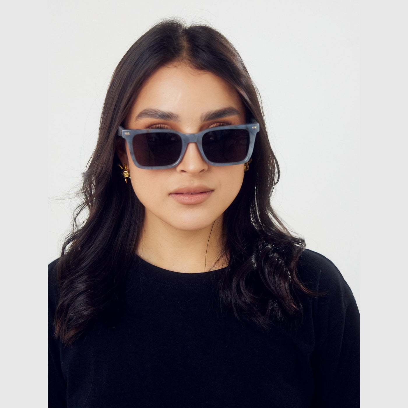 Detalle de los lentes de sol Ava Carey de Solivo Eyewear — filtro UV400, montura tortoise
