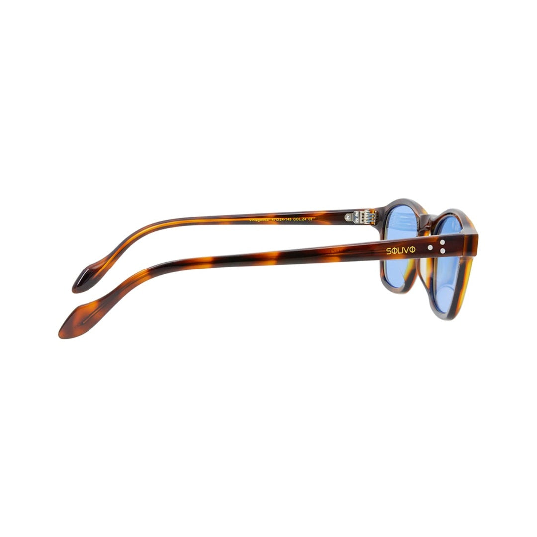 Vista trasera de los lentes de sol SUKI Carey Celeste de Solivo Eyewear — montura tortoise de acetato